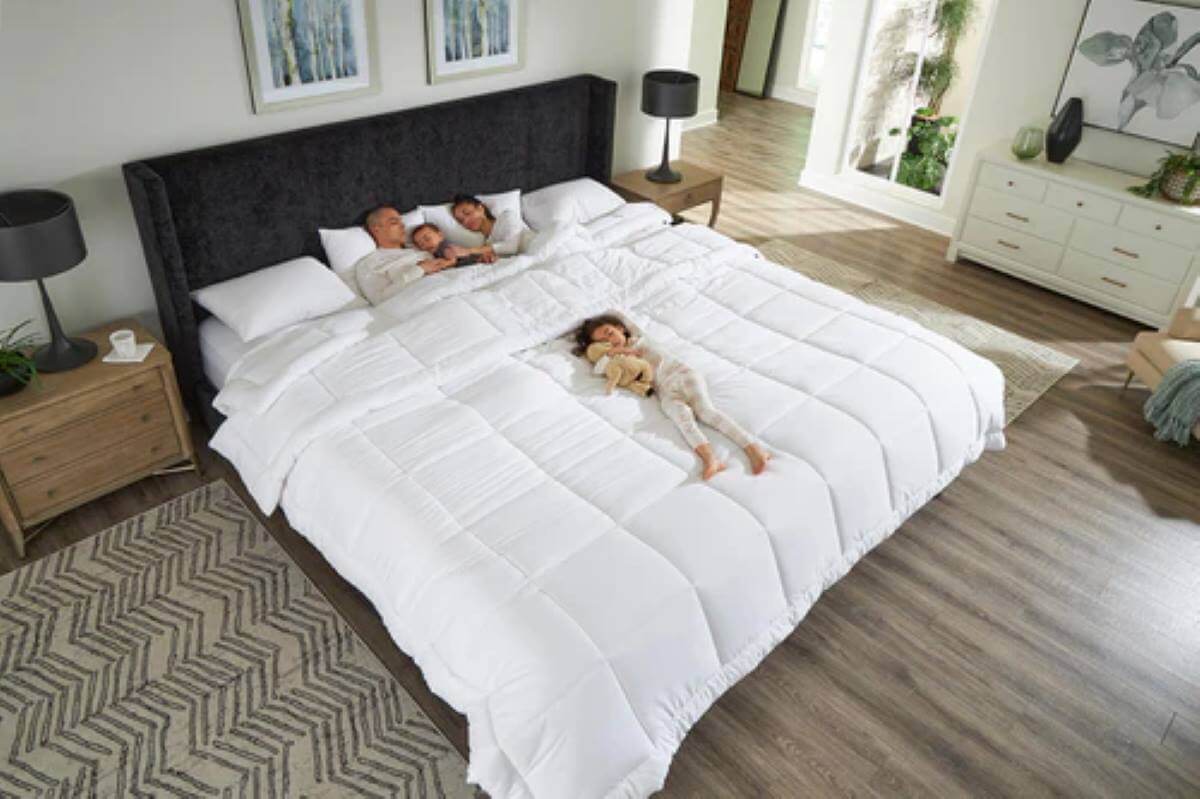 Family sleeping comfortably on an Alaskan King bed (108Γ108) in a spacious modern US bedroom